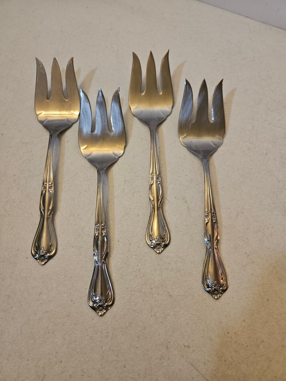 Lot of 4 stainless serving forks by International Silver Co floral flower design
